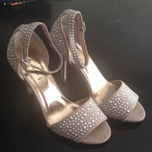 Madden Girl rhinestone-stuffed strapped heels.