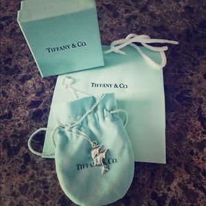 Tiffany dolphin charm and chain