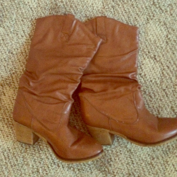 Brown cowgirl boots alittle lower then Knee high