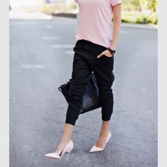Pants - Black joggers with loose fit.