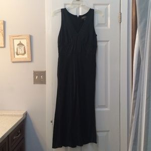 Black knee length dress.