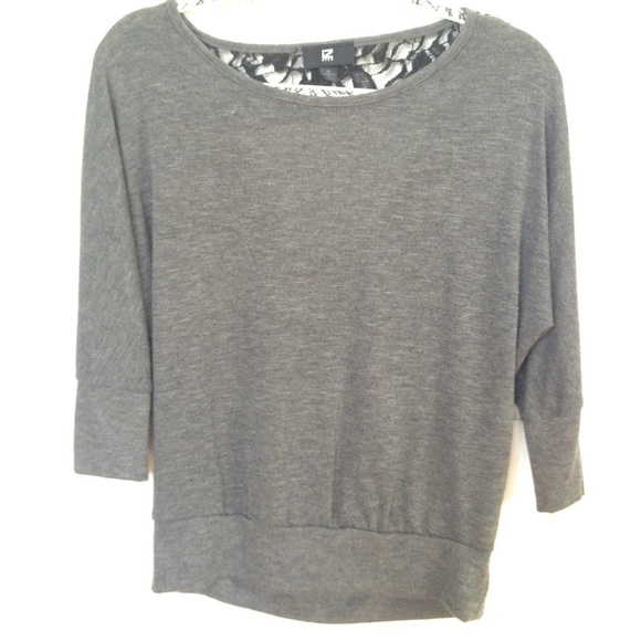 Grey shirt with a low back and lace