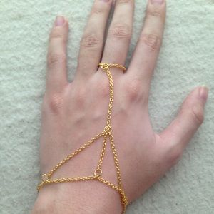 Gold hand chain •currently taking a break•