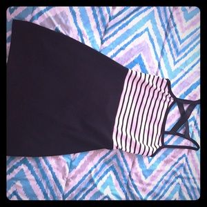 Small open back dress.