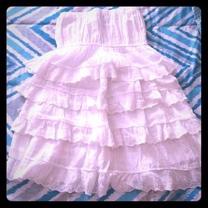 Small white ruffle dress.