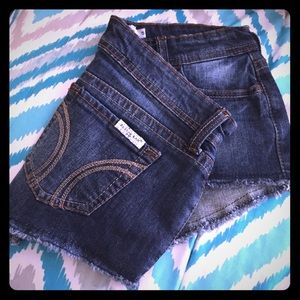 Dark denim shorts.