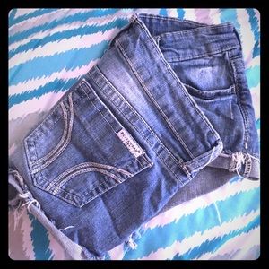Light distressed denim shorts