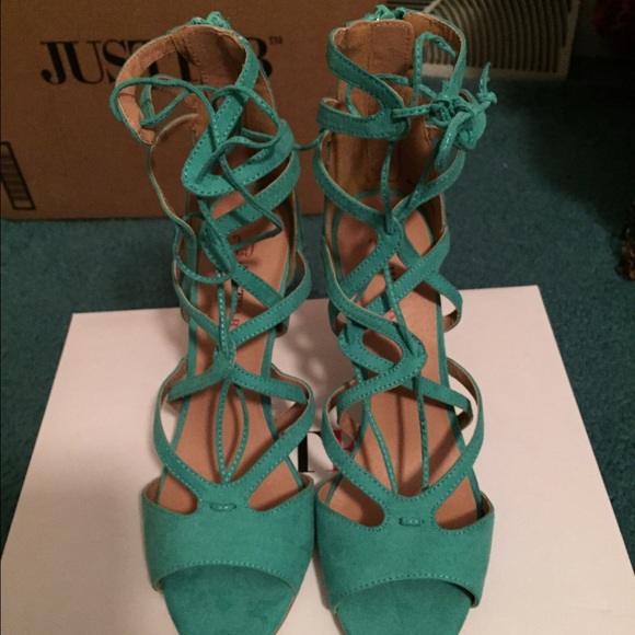 New lace up teal gladiator heels.
