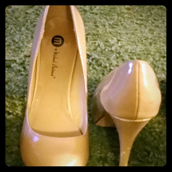 Tan almond toe pumps