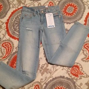 Justice slouchy low skinny jeans