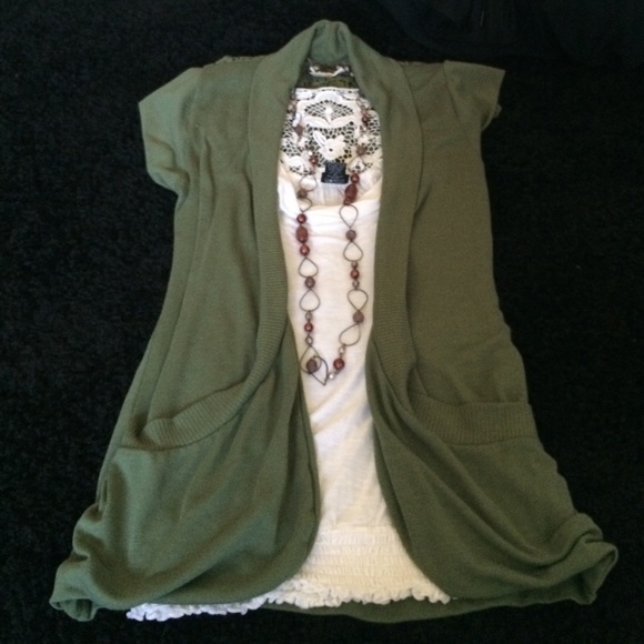 Olive green cardigan. White crochet back tank