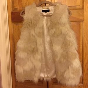 Edgy white fur vest