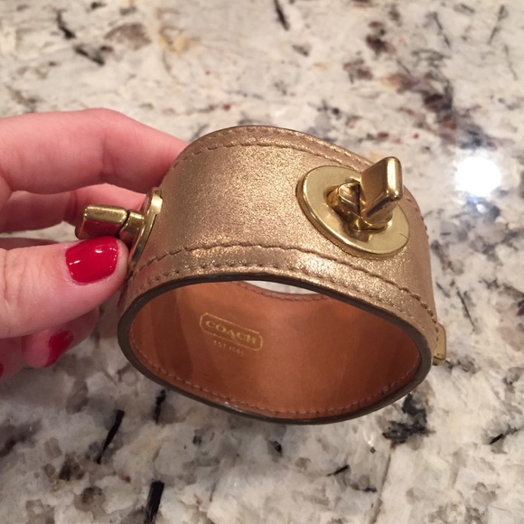 Gold metallic coach leather bracelet. Worn.