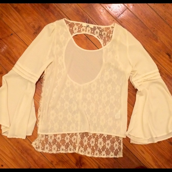 Sheer blouse with lace cut out back - Picture 1 of 2