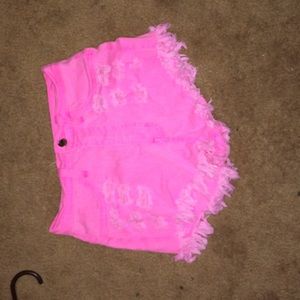 Neon pink high-waisted shorts