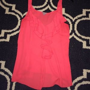Bright orange ruffle top