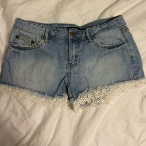 Denim shorts with lace