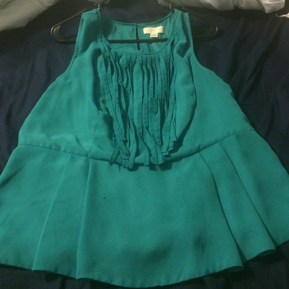 Newly added item never worn Teal peplum top