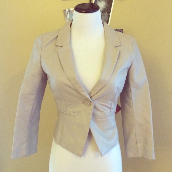 Fabulous & stylish faux cream leather jacket! NWT.