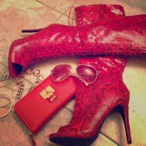 Faux-snakeskin knee-high boots