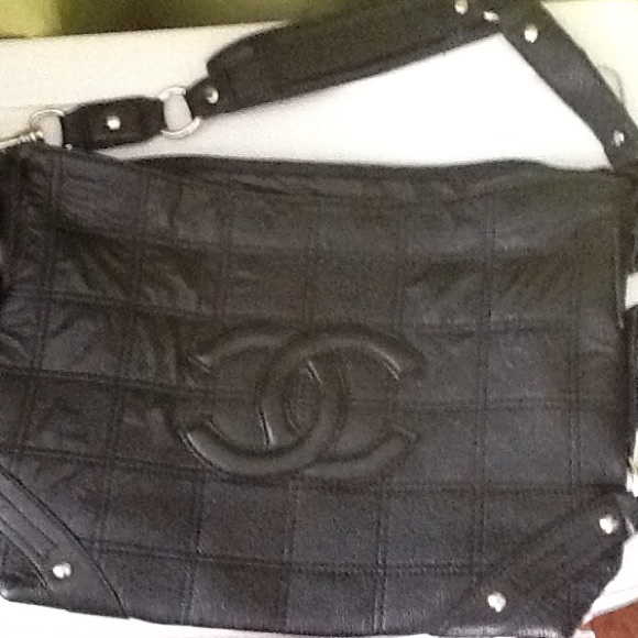 Handbag.   Holding for Tracey Sanchez