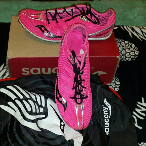 Pink and black track shoes