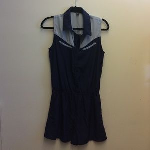 Navy blue romper with light blue accents