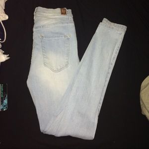 High waisted light blue jeans