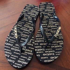 Bebe Flip Flops.