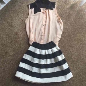 Black and white stiff bell skirt.