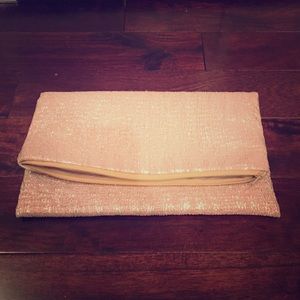 Ari Dionne gold shimmer foldover clutch
