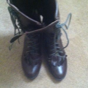 Lace up boots with fringe