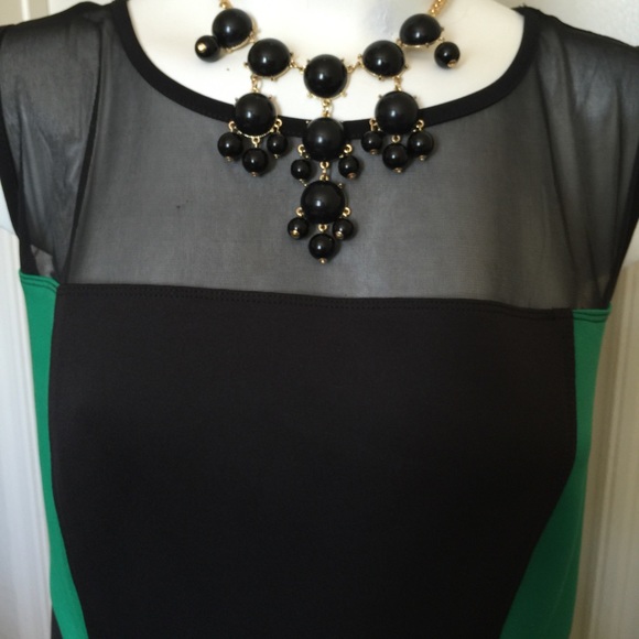 Green and Black body con dress