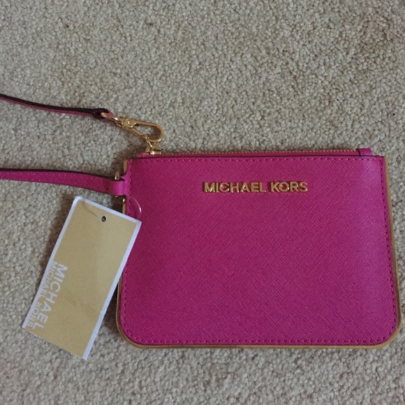 MICHAEL Kors Small Travel Wristlet in Fuchsia.