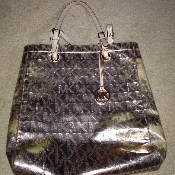 Metallic gold Michael Kors bag.