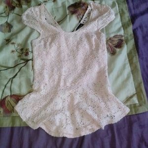 Light pink lace peplum top with open back