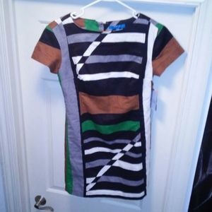 New with tags, fashionable yet edgy dress!