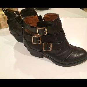 Black and gold booties