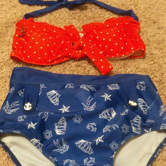 Navy blue and red polka dot bikini.