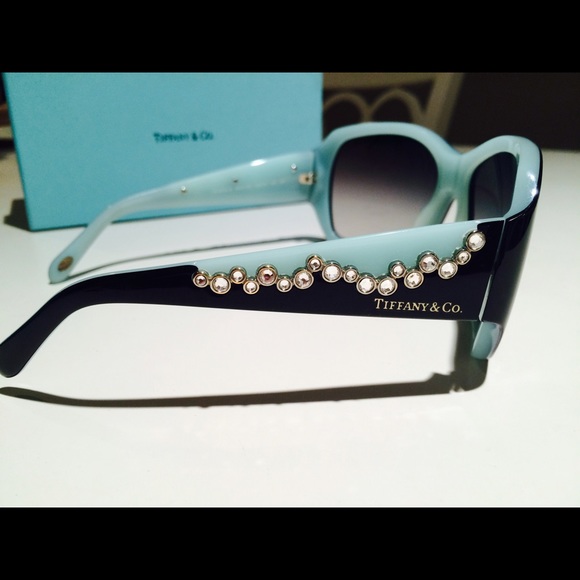 Tiffany & Co black and Tiffany blue sunglasses.