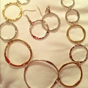 Gold and silver necklace with matching earrings