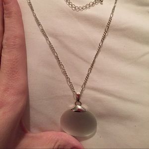 Silver necklace with a light grey stone