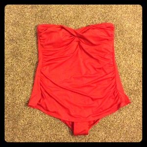 Red strapless one piece bathing suit