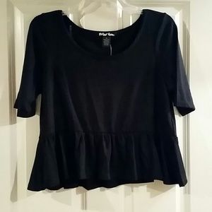 Somewhat loose black peplum top