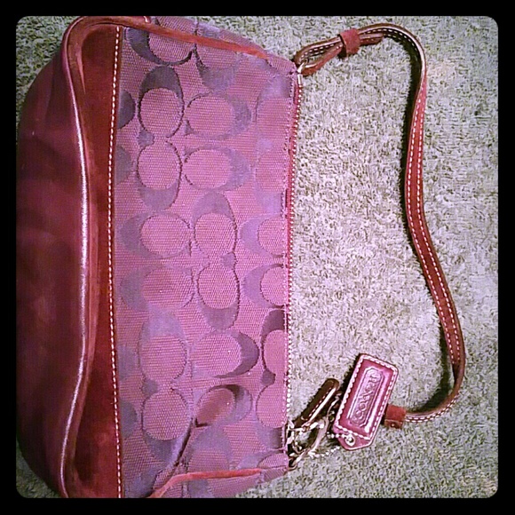Purple Coach mini purse with purple suede.