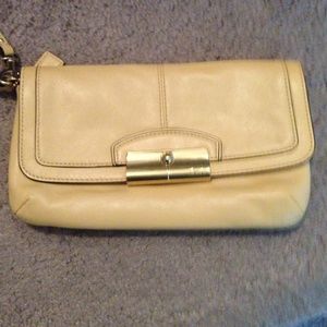 Coach leather clutch purse. New without tags.