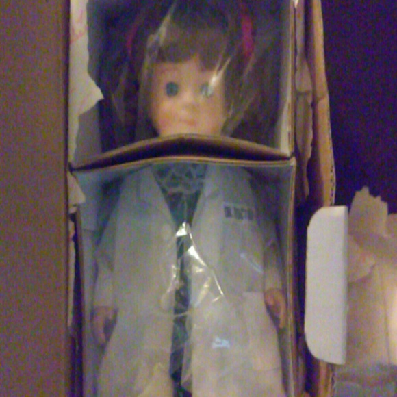 Fine vinyl collector doll