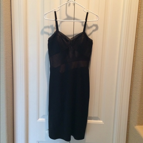 BCBG black dress. Beautiful detail,very flattering