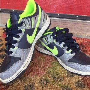 Navy and neon yellow Nike running sneakers