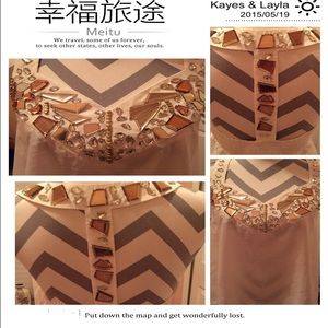 Gorgeous top vneck lined w/ crystals and beading.